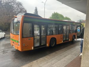 buses in italy outside railway station